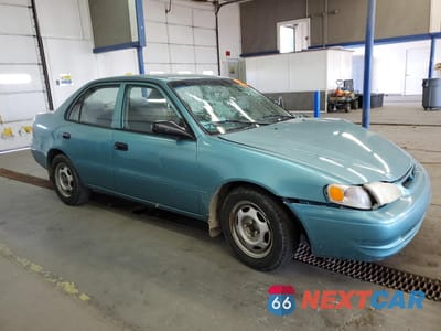 Czwarte zdjęcie samochodu z boku: 1999 TOYOTA COROLLA VE VIN:1NXBR12E5XZ230080 - miniatura