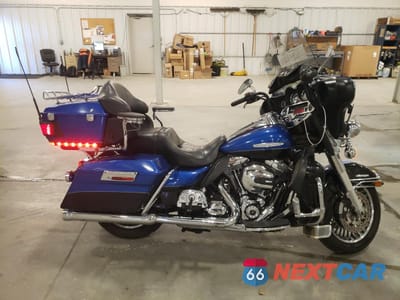 2010 HARLEY-DAVIDSON FLHTK 1HD1KEM15AB674776 - główne zdjęcie licytacji z USA - miniatura