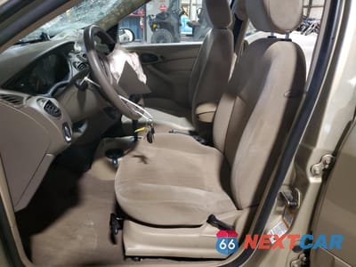 Zdjęcie 7 z 15 samochodu: 2000 FORD FOCUS SE VIN:1FAHP36P7YW219878 - miniatura