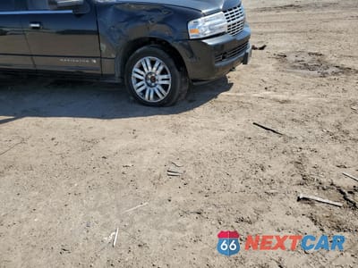 Czwarte zdjęcie samochodu z boku: 2012 LINCOLN NAVIGATOR L VIN:5LMJJ3H54CEL09117 - miniatura