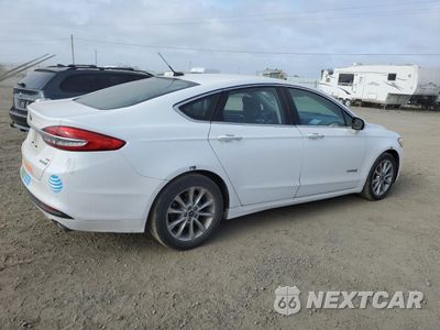 Trzecie zdjęcie samochodu z tyłu: 2017 FORD FUSION SE HYBRID VIN:3FA6P0LU5HR409441 - miniatura