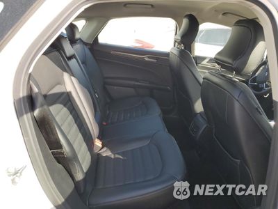Zdjęcie 10 z 13 samochodu: 2017 FORD FUSION SE HYBRID VIN:3FA6P0LU0HR400758 - miniatura