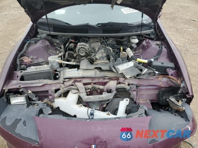 Zdjęcie 11 z 12 samochodu: 1996 CHEVROLET CAMARO BASE VIN:2G1FP22K9T2133044 - miniatura