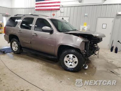 Czwarte zdjęcie samochodu z boku: 2012 CHEVROLET TAHOE K1500 LS VIN:1GNSKAE0XCR154935 - miniatura