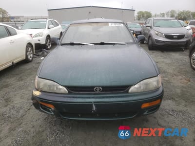 Piąte zdjęcie samochodu w środku: 1995 TOYOTA CAMRY LE VIN:4T1SK12E8SU523906 - miniatura