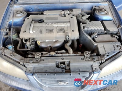 Zdjęcie 11 z 12 samochodu: 2004 HYUNDAI ELANTRA GLS VIN:KMHDN46DX4U832685 - miniatura
