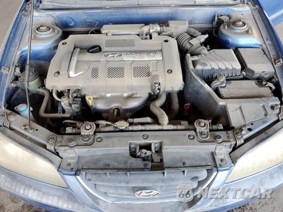 Zdjęcie 11 z 12 samochodu: 2004 HYUNDAI ELANTRA GLS VIN:KMHDN46DX4U832685 - miniatura