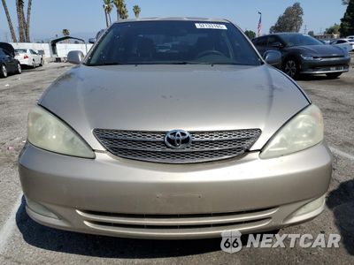 Piąte zdjęcie samochodu w środku: 2002 TOYOTA CAMRY LE VIN:JTDBE32K120032971 - miniatura