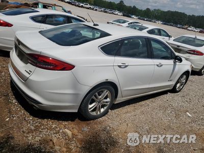 Trzecie zdjęcie samochodu z tyłu: 2018 FORD FUSION SE HYBRID VIN:3FA6P0LU8JR278690 - miniatura