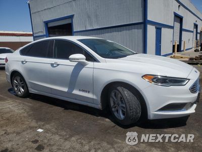 Czwarte zdjęcie samochodu z boku: 2018 FORD FUSION SE HYBRID VIN:3FA6P0LU7JR118669 - miniatura