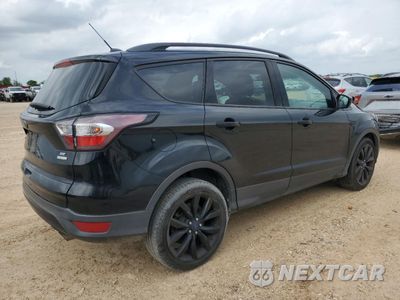 Trzecie zdjęcie samochodu z tyłu: 2017 FORD ESCAPE SE VIN:1FMCU0G99HUF06660 - miniatura