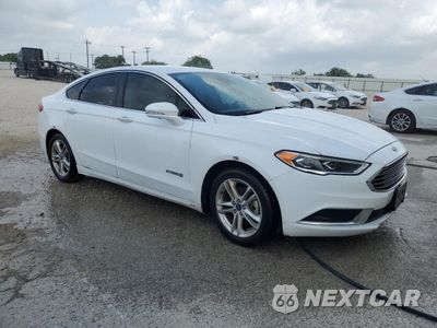 Czwarte zdjęcie samochodu z boku: 2018 FORD FUSION SE HYBRID VIN:3FA6P0LU2JR171666 - miniatura
