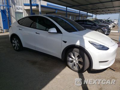 Czwarte zdjęcie samochodu z boku: 2022 TESLA MODEL Y VIN:7SAYGDEE9NF431927 - miniatura