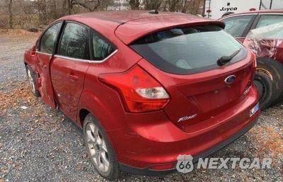 Trzecie zdjęcie samochodu z tyłu: 2012 FORD FOCUS TITANIUM VIN:1FAHP3N29CL445355 - miniatura