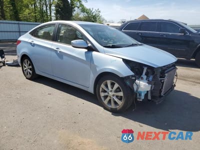 Czwarte zdjęcie samochodu z boku: 2014 HYUNDAI ACCENT GLS VIN:KMHCU4AE3EU699770 - miniatura