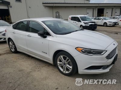 Czwarte zdjęcie samochodu z boku: 2018 FORD FUSION SE HYBRID VIN:3FA6P0LU5JR129928 - miniatura