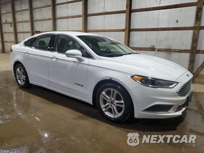 Czwarte zdjęcie samochodu z boku: 2018 FORD FUSION SE HYBRID VIN:3FA6P0LU5JR172052 - miniatura