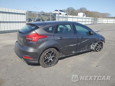 Trzecie zdjęcie samochodu z tyłu: 2016 FORD FOCUS SE VIN:1FADP3K23GL236203 - miniatura