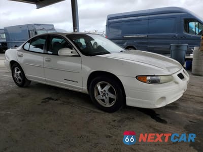 Czwarte zdjęcie samochodu z boku: 2003 PONTIAC GRAND PRIX SE VIN:1G2WK52J83F148149 - miniatura