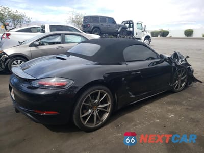 Trzecie zdjęcie samochodu z tyłu: 2021 PORSCHE BOXSTER BASE VIN:WP0CA2A85MS210405 - miniatura