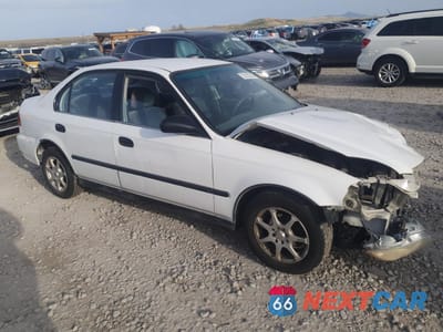 Czwarte zdjęcie samochodu z boku: 1997 HONDA CIVIC DX VIN:1HGEJ662XVL002876 - miniatura