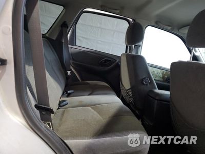 Zdjęcie 11 z 13 samochodu: 2004 MAZDA TRIBUTE LX VIN:4F2CZ94184KM13725 - miniatura