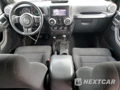 Zdjęcie 8 z 12 samochodu: 2011 JEEP WRANGLER UNLIMITED SAHARA VIN:1J4BA5H19BL615464 - miniatura