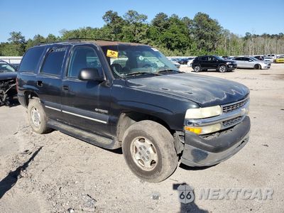 Czwarte zdjęcie samochodu z boku: 2003 CHEVROLET TAHOE C1500 VIN:1GNEC13V73J316222 - miniatura