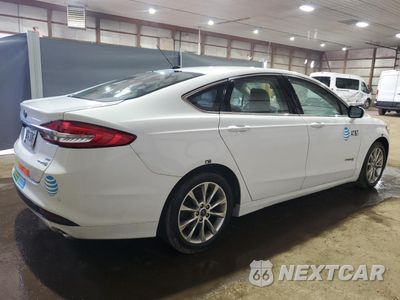 Trzecie zdjęcie samochodu z tyłu: 2017 FORD FUSION SE HYBRID VIN:3FA6P0LUXHR410133 - miniatura