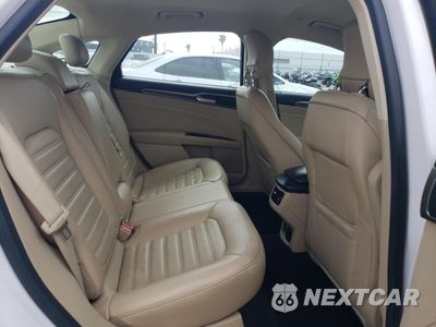 Zdjęcie 10 z 14 samochodu: 2014 FORD FUSION SE HYBRID VIN:3FA6P0LU0ER307086 - miniatura