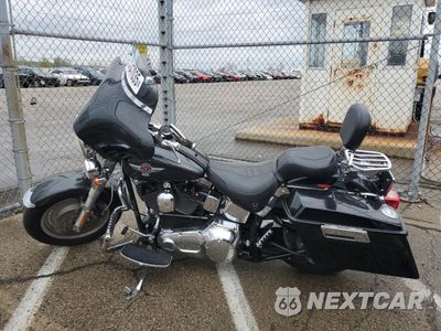 Trzecie zdjęcie samochodu z tyłu: 2006 HARLEY-DAVIDSON FLSTFI VIN:1HD1BXB126Y087762 - miniatura