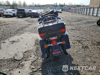 Czwarte zdjęcie samochodu z boku: 2010 HARLEY-DAVIDSON FLHTK VIN:1HD1KEM14AB635113 - miniatura