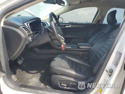 Zdjęcie 7 z 13 samochodu: 2017 FORD FUSION SE HYBRID VIN:3FA6P0LUXHR409550 - miniatura