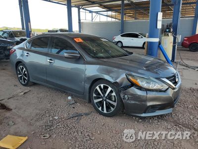 Czwarte zdjęcie samochodu z boku: 2018 NISSAN ALTIMA 2.5 VIN:1N4AL3AP8JC244719 - miniatura
