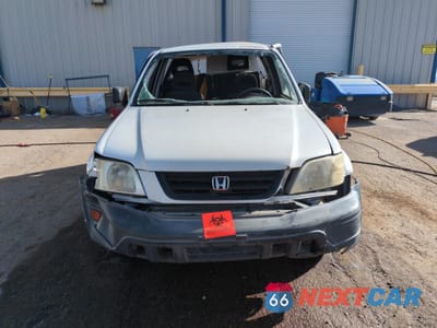 Piąte zdjęcie samochodu w środku: 1999 HONDA CR-V LX VIN:JHLRD2842XC007705 - miniatura