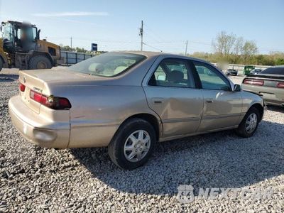 Trzecie zdjęcie samochodu z tyłu: 1999 TOYOTA CAMRY LE VIN:JT2BG22K4X0303476 - miniatura