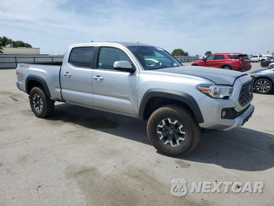 Czwarte zdjęcie samochodu z boku: 2023 TOYOTA TACOMA DOUBLE CAB VIN:3TMDZ5BN4PM169149 - miniatura