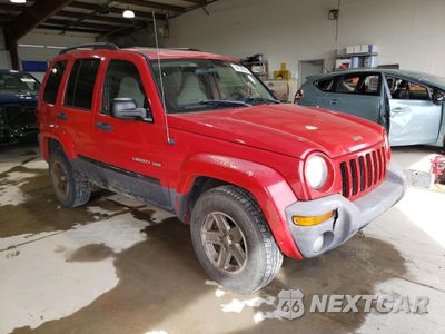 Czwarte zdjęcie samochodu z boku: 2004 JEEP LIBERTY SPORT VIN:1J4GL48K84W176777 - miniatura
