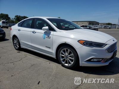 Czwarte zdjęcie samochodu z boku: 2017 FORD FUSION SE HYBRID VIN:3FA6P0LU9HR409359 - miniatura