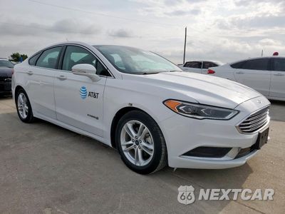 Czwarte zdjęcie samochodu z boku: 2018 FORD FUSION SE HYBRID VIN:3FA6P0LU9JR171678 - miniatura