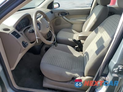 Zdjęcie 7 z 12 samochodu: 2004 FORD FOCUS ZX4 VIN:1FAHP34N06W142317 - miniatura