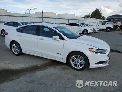 Czwarte zdjęcie samochodu z boku: 2018 FORD FUSION SE HYBRID VIN:3FA6P0LU6JR118758 - miniatura