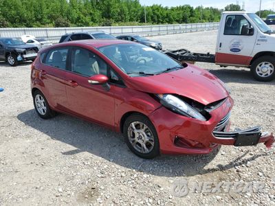 Czwarte zdjęcie samochodu z boku: 2014 FORD FIESTA SE VIN:3FADP4EJXEM233013 - miniatura