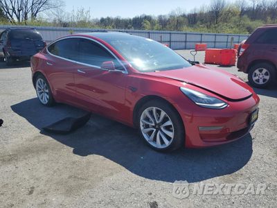 Czwarte zdjęcie samochodu z boku: 2019 TESLA MODEL 3 VIN:5YJ3E1EB4KF361346 - miniatura