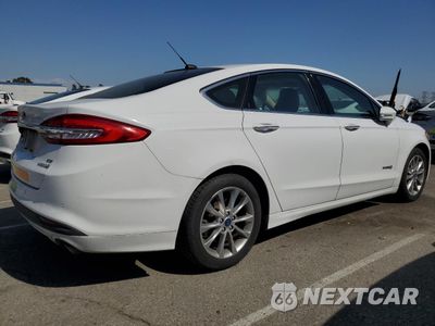 Trzecie zdjęcie samochodu z tyłu: 2017 FORD FUSION SE HYBRID VIN:3FA6P0LU6HR409366 - miniatura
