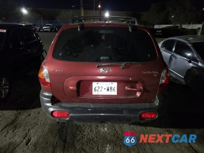 Zdjęcie 6 z 12 samochodu: 2004 HYUNDAI SANTA FE GLS VIN:KM8SC13D74U847113 - miniatura