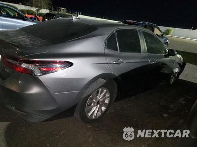 Trzecie zdjęcie samochodu z tyłu: 2021 TOYOTA CAMRY LE VIN:4T1C11AKKMU519521 - miniatura
