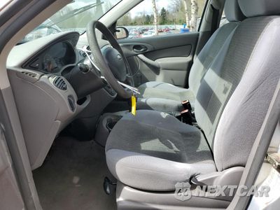 Zdjęcie 7 z 15 samochodu: 2004 FORD FOCUS LX VIN:1FAFP33PX4W132594 - miniatura