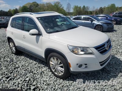 Czwarte zdjęcie samochodu z boku: 2011 VOLKSWAGEN TIGUAN S VIN:WVGBV7AX4BW503167 - miniatura