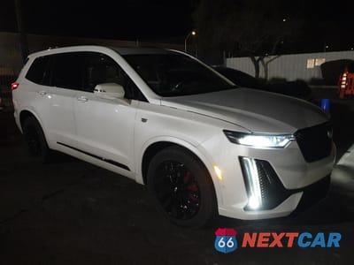 Czwarte zdjęcie samochodu z boku: 2022 CADILLAC XT6 SPORT PLATINUM VIN:1GYKPHRSXNZ214176 - miniatura